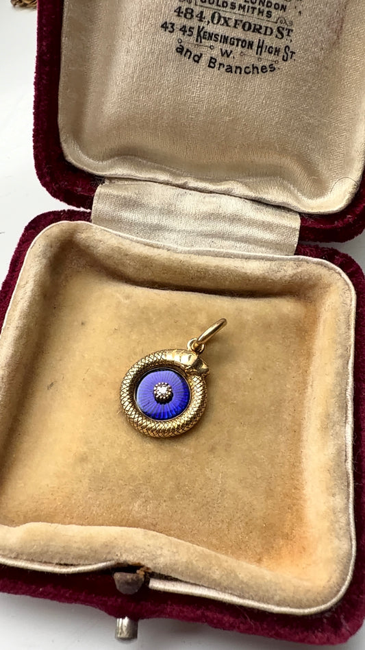 18ct ouroboros pendants