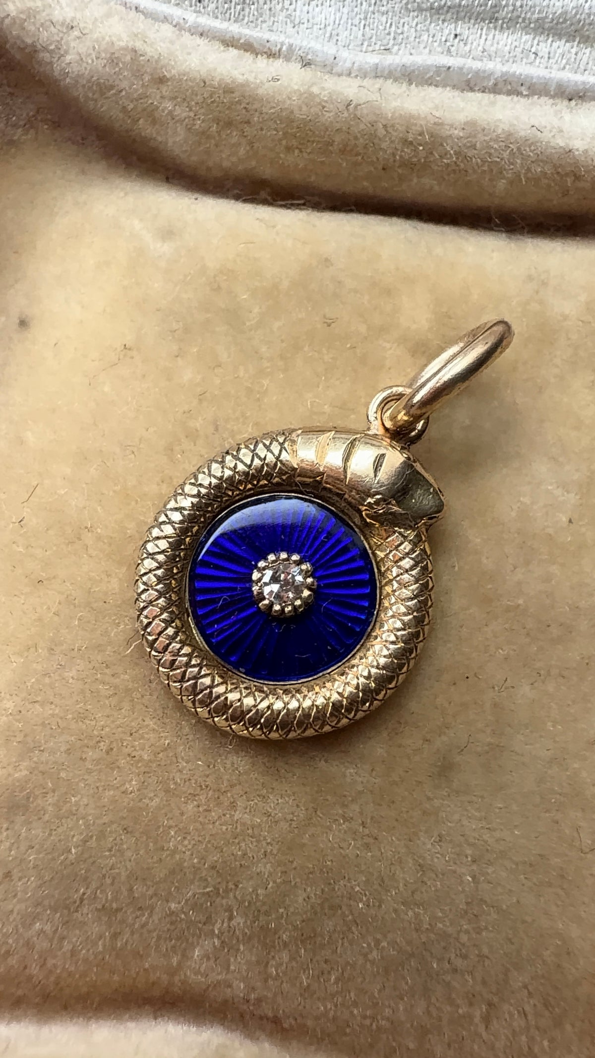 18ct ouroboros pendants