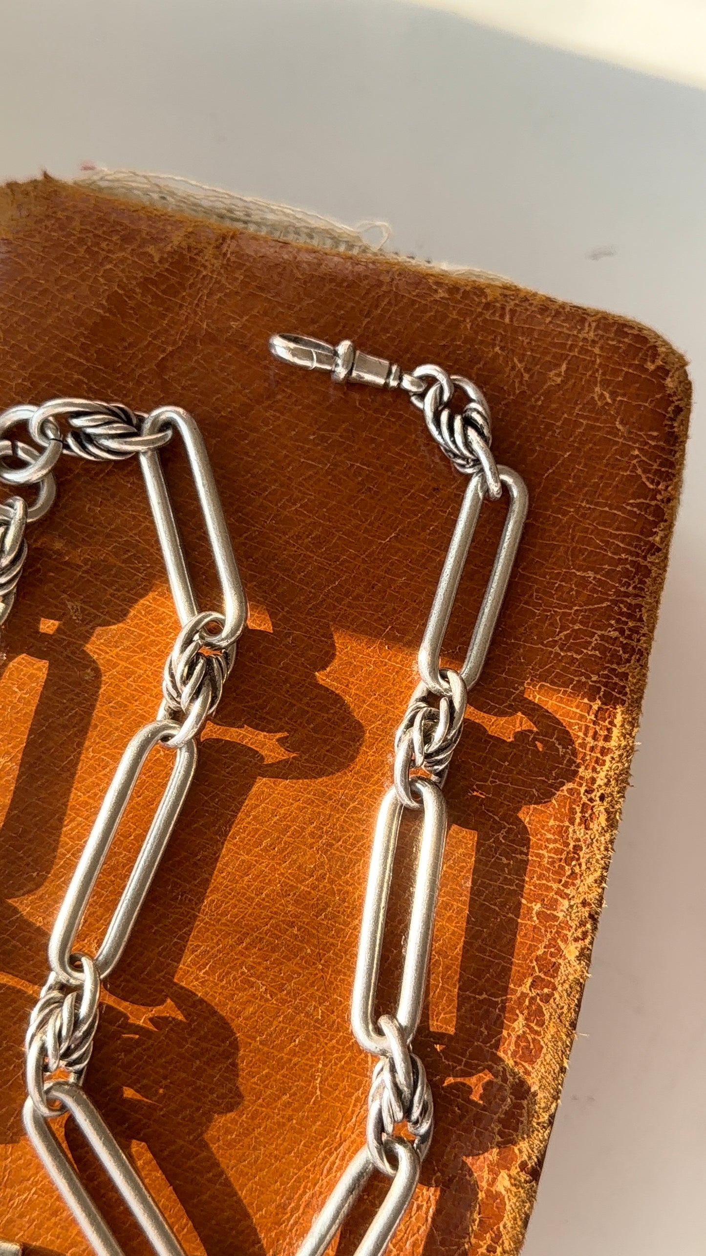Antique Silver love knot trombone